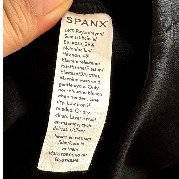 NWT Spanx The Perfect Jumpsuit Black Sleeveless Shaping Tech Flare Size Medium - Picture 12 of 12